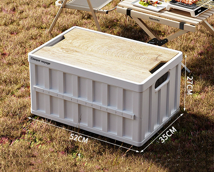 white collapsible camping box with table lid on plain background