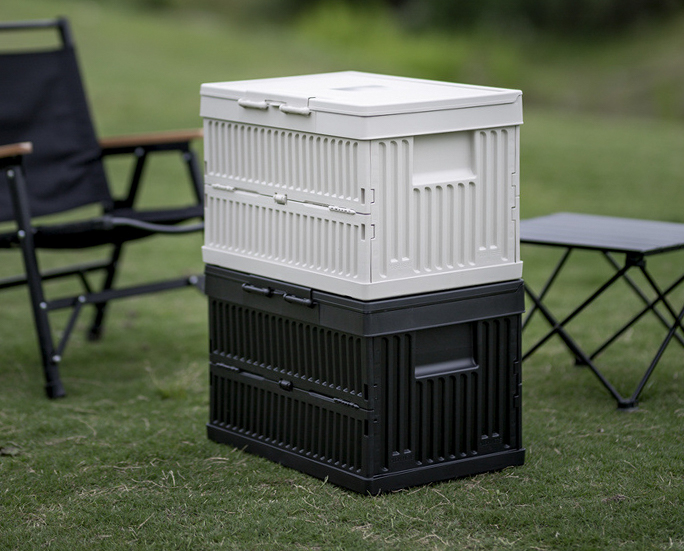 Two-tone foldable storage boxes stacked for outdoor camping