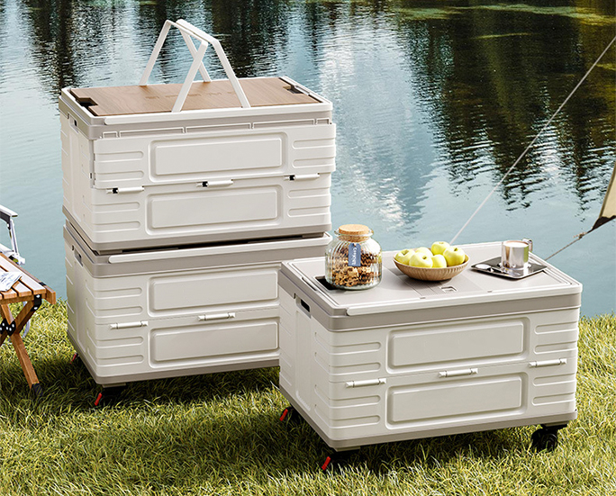 Outdoor scene with stacked storage boxes near lake