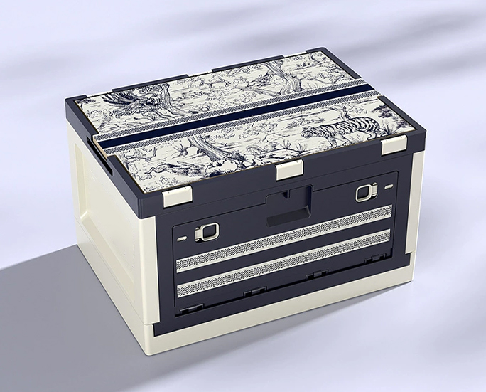 Decorative foldable storage box with illustrated jungle lid and dark blue sides