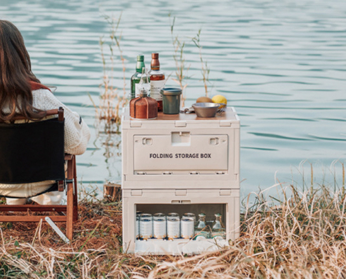 Stackable storage boxes with wooden tops outdoors