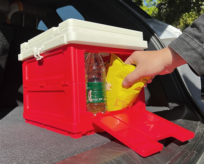 This close-up image shows the innovative lid design of our foldable storage box. The tabletop features multiple recessed cup holders, allowing for stable drink placement during outdoor use. Designed for maximum convenience, the surface accommodates mugs, bottles, and small items, preventing spills on uneven terrain. Ideal for camping setups, backyard gatherings, or as a compact tailgate table.