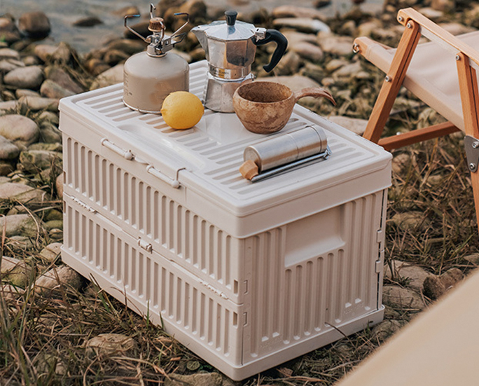 Cream foldable storage box with coffee pot, gas stove, and lemon