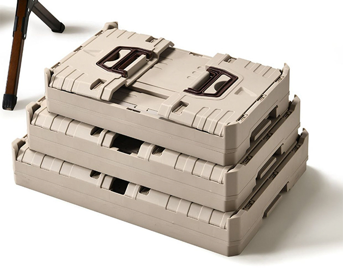 Folded beige plastic crates stacked flat for storage