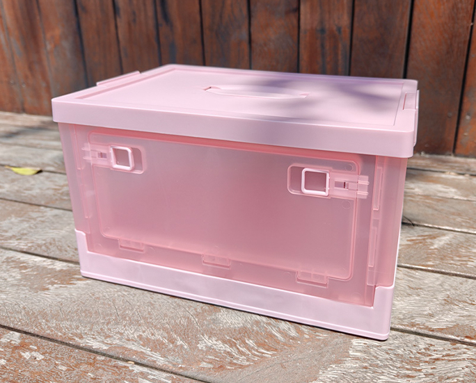 Top-view angle of pink folding box with integrated handle